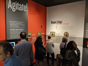 Visitors exploring Frederick Douglass: Agitator exhibit at the American Writers Museum