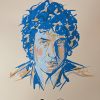 A sketchy drawing print of Bob Dylan in blues and oranges on a beige background. The American Writers Museum logo and Bob Dylan: Electric logo are below the drawing.