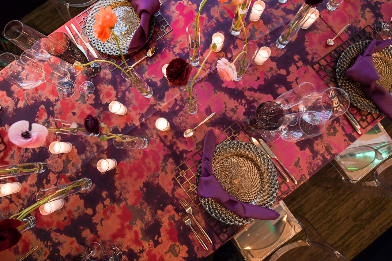 A pink and purple table setting for a private rental event at the American Writers Museum in Chicago